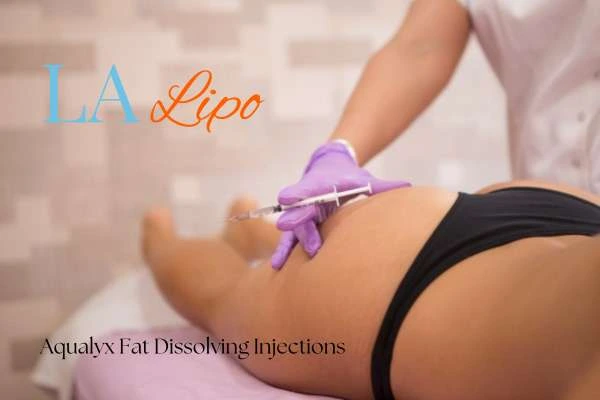 Woman having fat dissolving injections Merthyr Tydfil on thighs