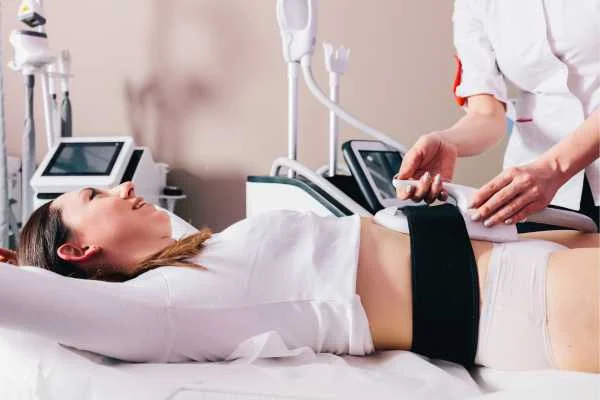 woman having body sculpting to help improve her body image and her mental health Merthyr Tydfil